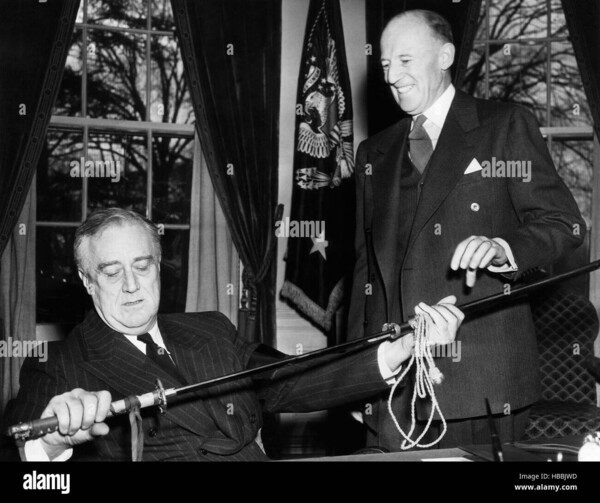 president-franklin-d-roosevelt-left-receives-the-saber-of-a-dead-japanese-HBBJWD.thumb.jpg.84ce0e1bed96c5ab3e47c481da295c7d.jpg