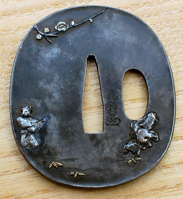 Tsuba.thumb.JPG.f435c241380d3086dbded16ed610b3f7.JPG